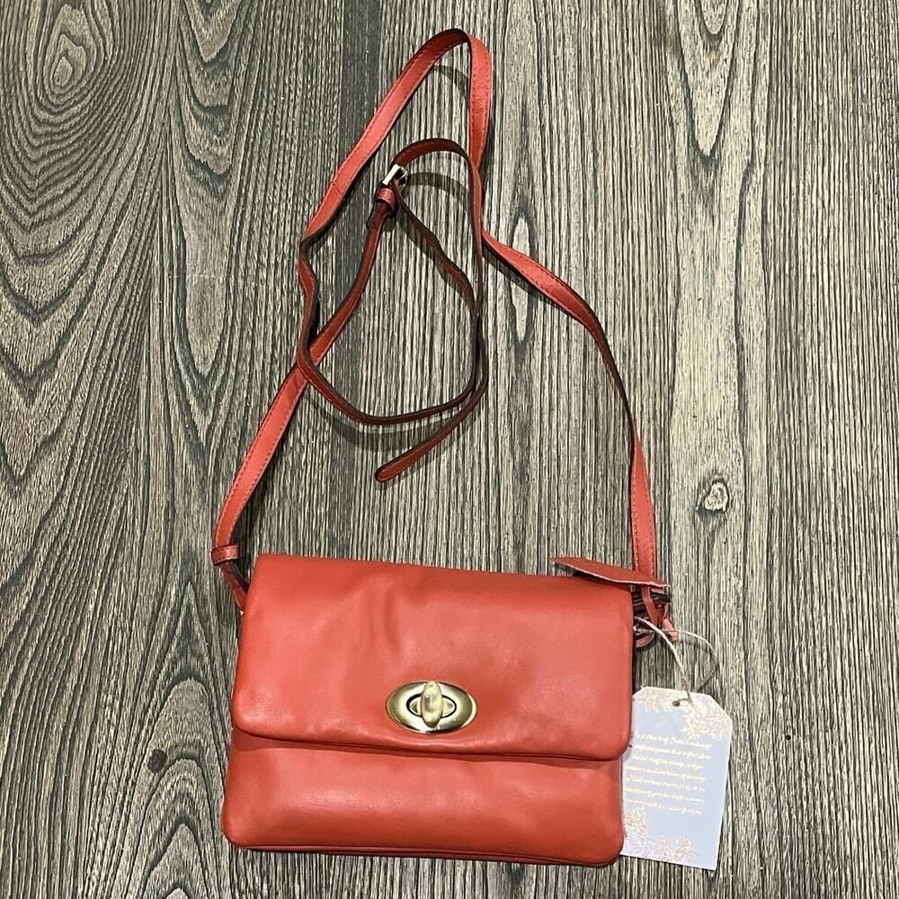 NWT Womens Genuine Leather Crossbody Bag Twist Closure Striped Interior Orange